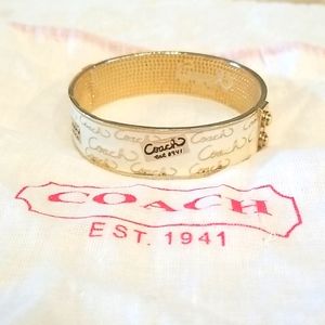 Coach brass bangle